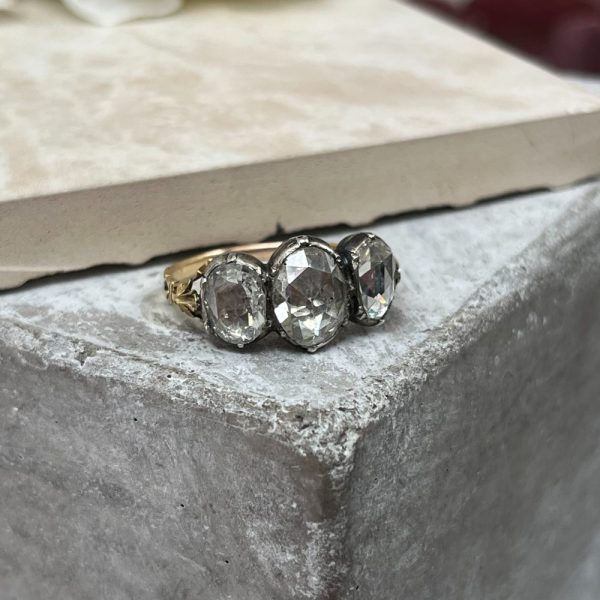 Antique 19th century three stone diamond ring in 18ct yellow gold and silver with rose-cut diamonds