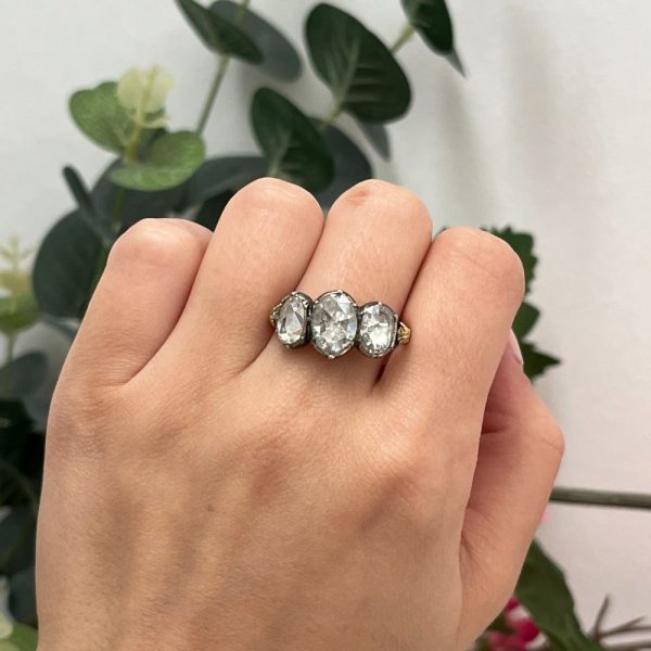 Antique 19th century three stone diamond ring in 18ct yellow gold and silver with rose-cut diamonds