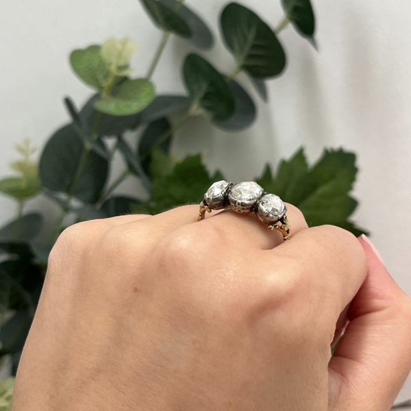 Antique 19th century three stone diamond ring in 18ct yellow gold and silver with rose-cut diamonds