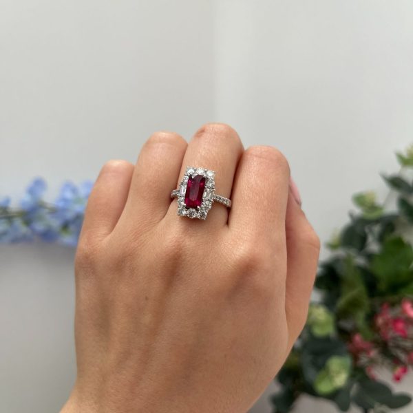Natural no heNatural no heat pigeon blood ruby and diamond cluster ring in platinum with GRS certification.at pigeon blood ruby and diamond cluster ring in platinum with diamond halo and GRS certification