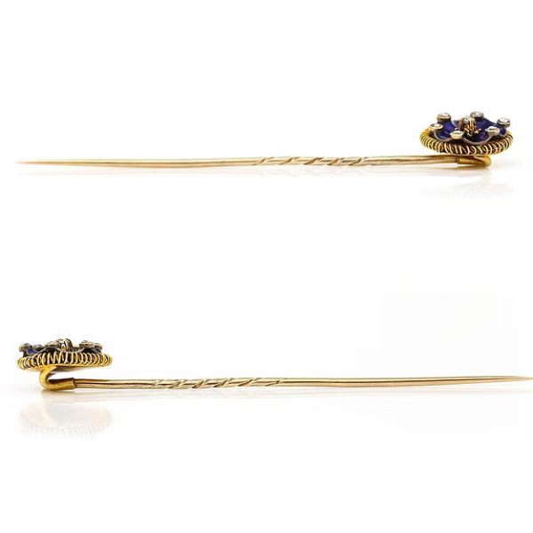 Antique Victorian 15ct gold stick pin featuring dark blue enamel and rose-cut diamonds in a floral ribbon design, circa 1890