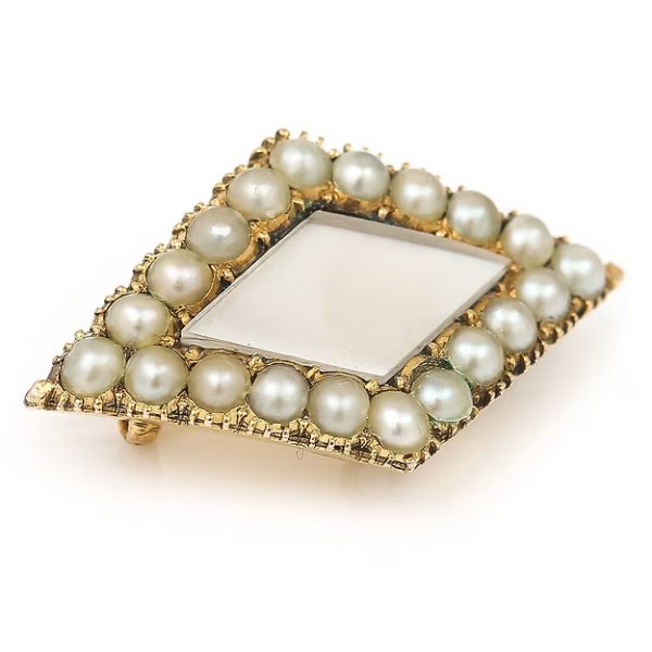 Antique Victorian 18ct gold rhomboid mourning brooch with original split pearls and a carved central pearl panel, circa 1880.