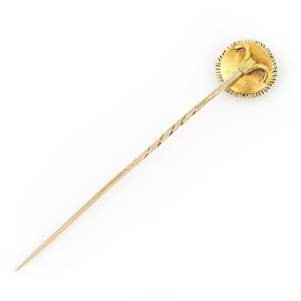 Antique Victorian 15ct gold stick pin featuring dark blue enamel and rose-cut diamonds in a floral ribbon design, circa 1890