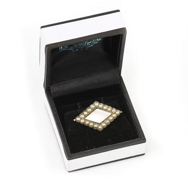 Antique Victorian 18ct gold rhomboid mourning brooch with original split pearls and a carved central pearl panel, circa 1880.