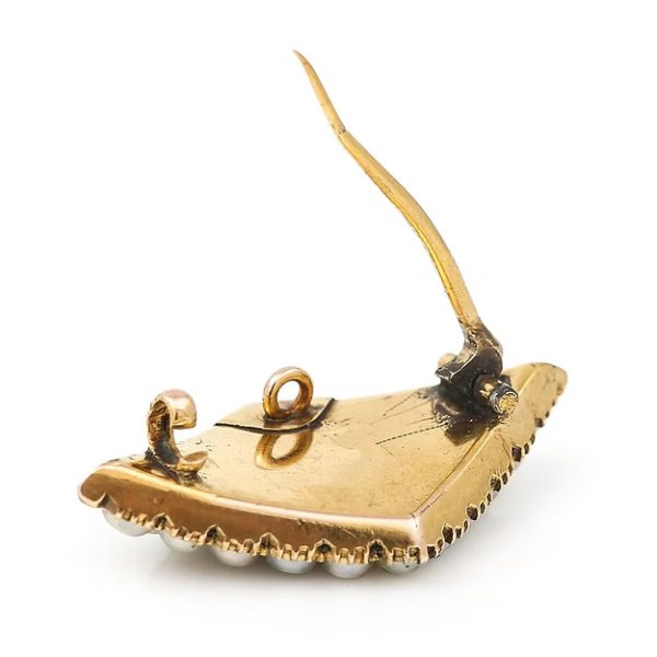 Antique Victorian 18ct gold rhomboid mourning brooch with original split pearls and a carved central pearl panel, circa 1880.