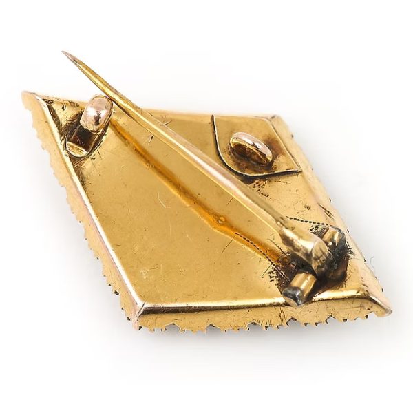 Antique Victorian 18ct gold rhomboid mourning brooch with original split pearls and a carved central pearl panel, circa 1880.