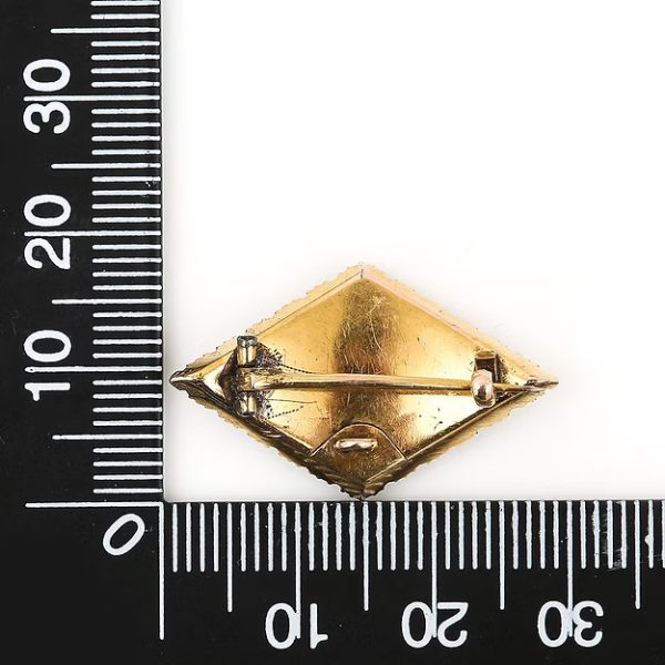 Antique Victorian 18ct gold rhomboid mourning brooch with original split pearls and a carved central pearl panel, circa 1880.