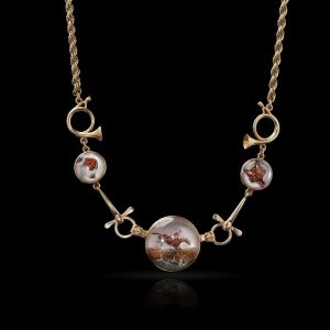 Antique gold necklace with carved Essex crystals.