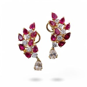 Vintage ruby and diamond earrings in gold.