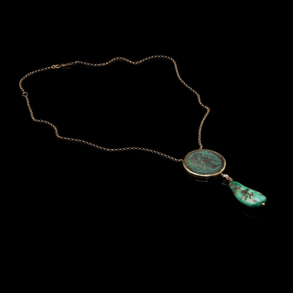 Gold necklace with trajan coin, turquoise drop and diamond.