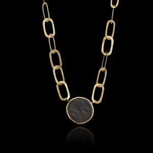 Gold chain necklace with Byzantine coin pendant.