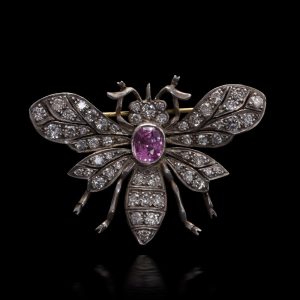 Edwardian pink sapphire and diamond insect brooch in gold and silver.