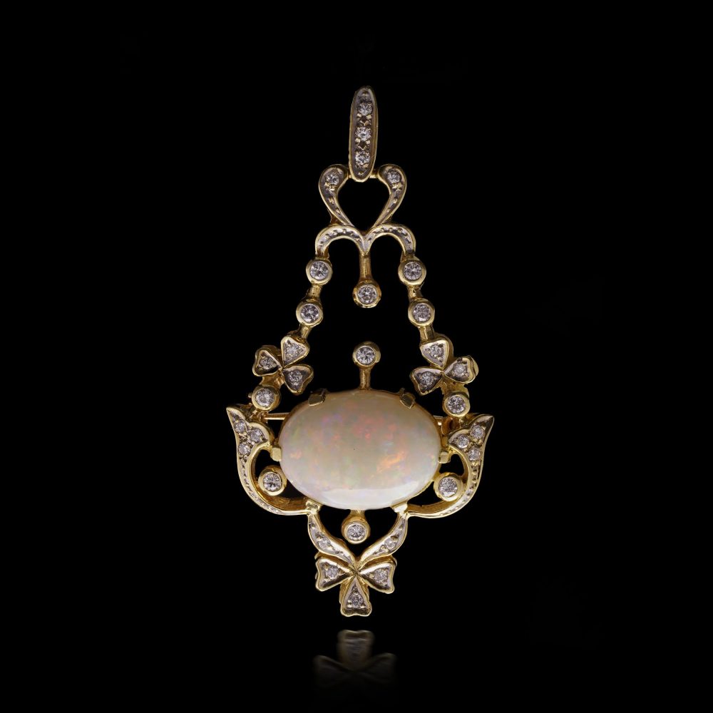 Vintage opal and diamond pendant/brooch in gold.