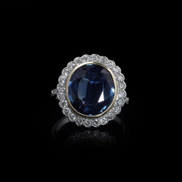 Certified 6ct Natural No Heat Sapphire and Diamond Cluster Ring, certified natural unheated sapphire framed by scalloped halo of 32 brilliant-cut diamonds in 18ct gold and platinum