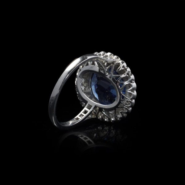 Certified 6ct Natural No Heat Sapphire and Diamond Cluster Ring, certified natural unheated sapphire framed by scalloped halo of 32 brilliant-cut diamonds in 18ct gold and platinum