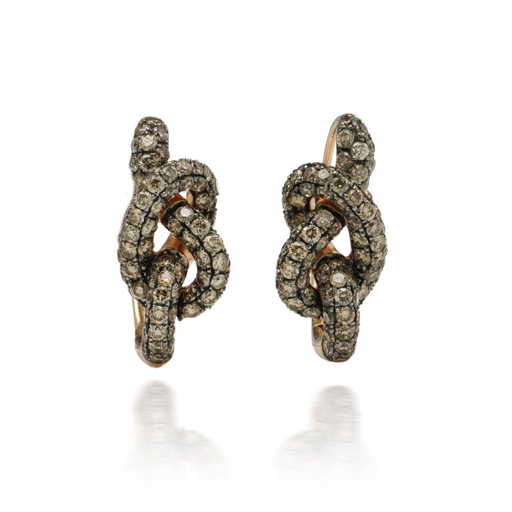 Pippo Perez diamond knot earrings in gold.