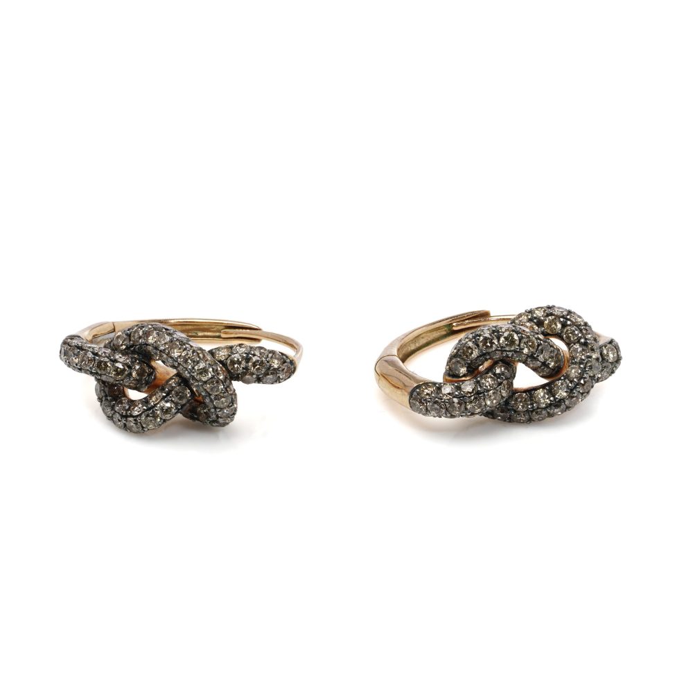 Pippo Perez diamond knot earrings in gold.