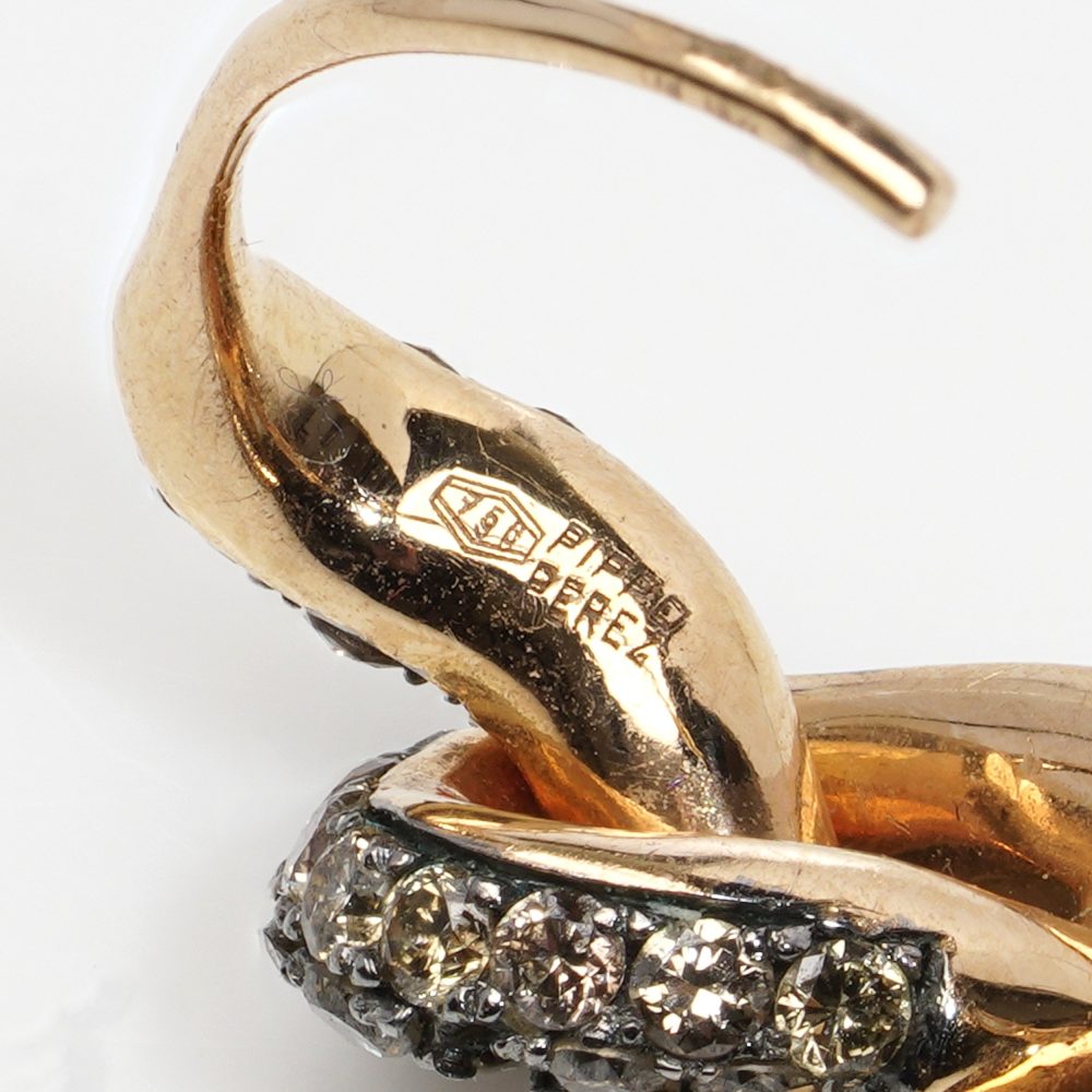 Pippo Perez diamond knot earrings in gold.
