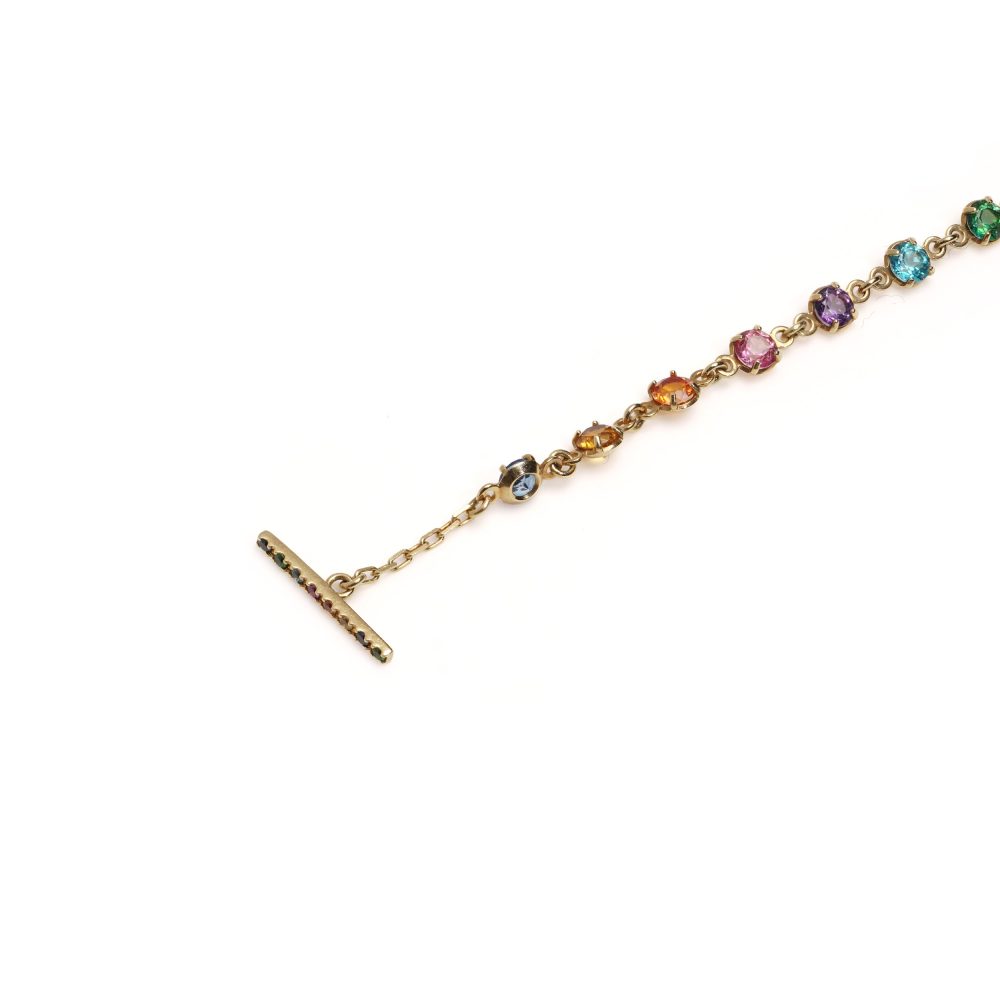 Gucci multi-gemstone bracelet in gold.