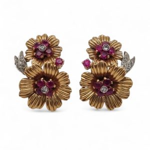Pair of ruby and diamond floral clip-on earrings in 18ct yellow gold.