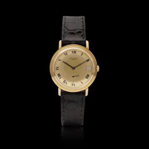 Patek Philippe men's vintage wristwatch in gold.