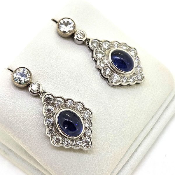 Cabochon Sapphire and Diamond Cluster Drop Earrings with Detachable Stud Tops, oval cabochon sapphires set within diamond studded navette cluster surrounds in 18ct white gold