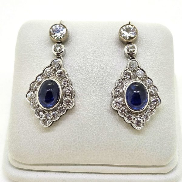 Cabochon Sapphire and Diamond Cluster Drop Earrings with Detachable Stud Tops, oval cabochon sapphires set within diamond studded navette cluster surrounds in 18ct white gold