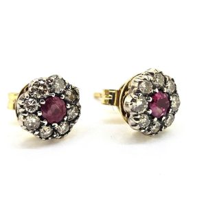 Ruby and Diamond Cluster Stud Earrings, central rubies surrounded by diamonds, mounted in silver on 18ct yellow gold
