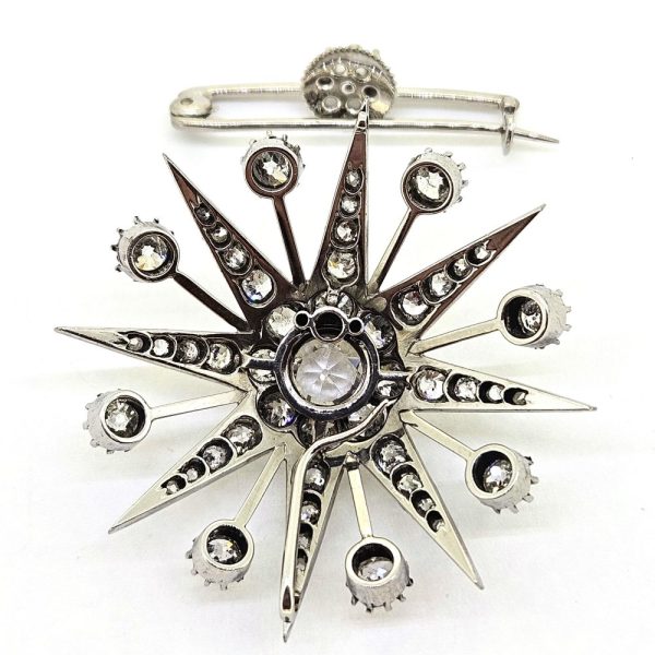 Antique Old Cut Diamond Star Brooch, 7.45 carat total, central 2.15ct old-cut diamond leads to eight star-points set with graduating old-cut diamonds with a diamond ray between