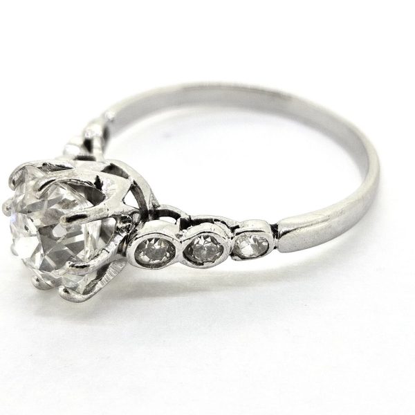 1.70ct Old Cut Diamond Solitaire Engagement Ring, single stone 1.70 carat old-cut diamond eight-claw set and flanked by bezel set diamonds to the shoulders