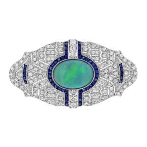 1.80ct Black Opal Sapphire and Diamond Brooch, 1.80 carat oval cabochon black opal with rich blue sapphire border surrounded by sparkling diamonds in 18ct white gold
