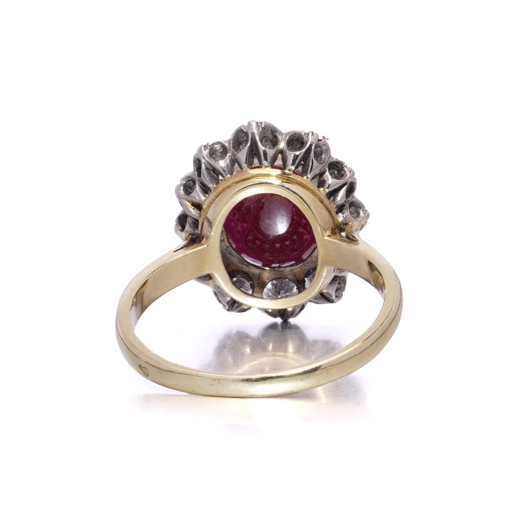 Ruby and diamond ring in yellow and white gold.