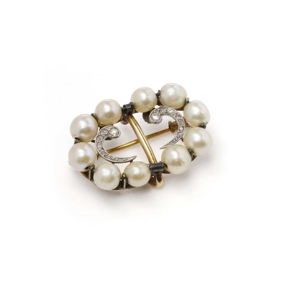 Edwardian pearl and diamond brooch in platinum and gold.