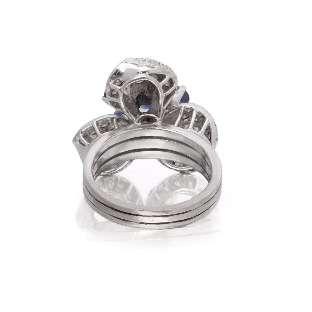 Diamond and sapphire cluster ring in white gold.