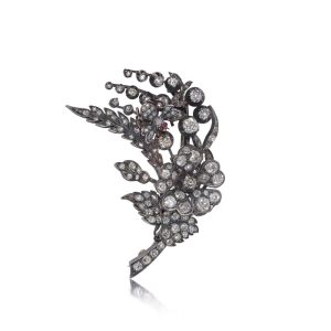 Victorian diamond floral brooch in gold and silver.