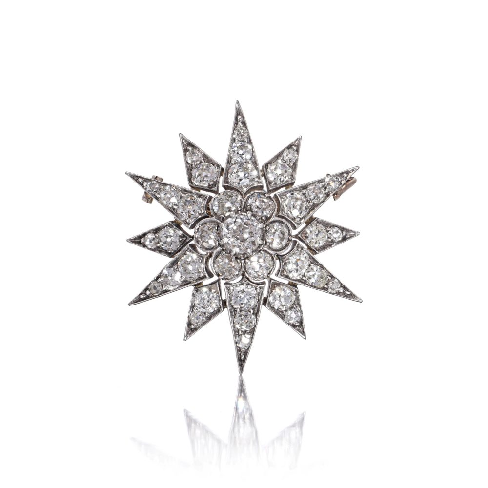 Antique 4ct Old Cut Diamond Star Brooch, 37 old-cut and Old European cut diamonds within radiating arms in silver to 9ct yellow gold