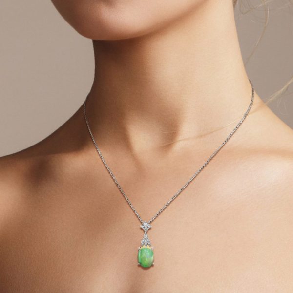 3.62ct Oval Opal and Diamond Pendant Necklace, 3.62 carat oval cabochon Australian opal with play-of-colour suspended from diamond fleur-de-lis top in 18ct white gold