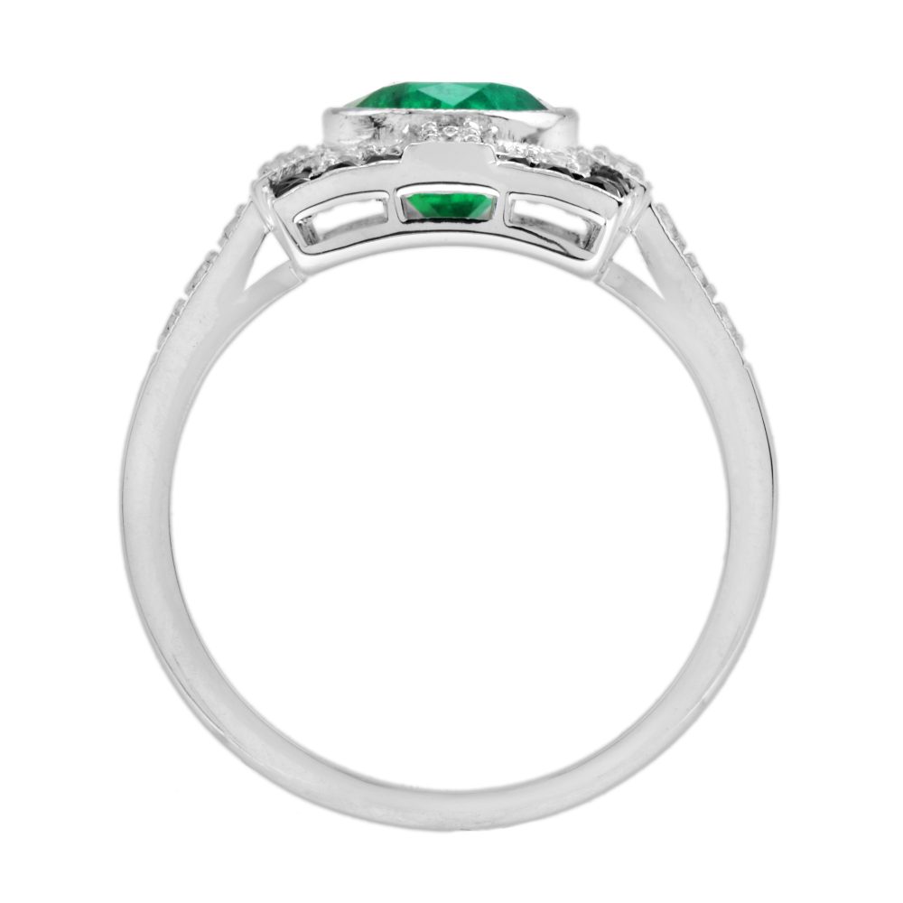1.80ct. Emerald Diamond and Black Onyx Cluster Plaque Ring, 1.80ct oval vivid green emerald surrounded by sparkling diamonds framed with a sleek black onyx border in 18ct white gold
