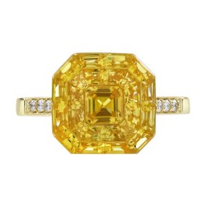 Illusion Set Yellow Sapphire Cluster Solitaire Engagement Ring in 18ct Yellow Gold with diamond shoulders, calibre cut yellow sapphires invisible reverse channel set creating striking octagonal-cut single stone result