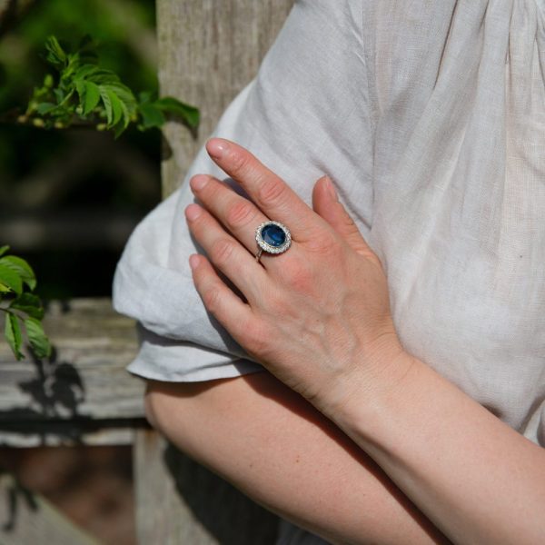 Certified 6ct Natural No Heat Sapphire and Diamond Cluster Ring, certified natural unheated sapphire framed by scalloped halo of 32 brilliant-cut diamonds in 18ct gold and platinum