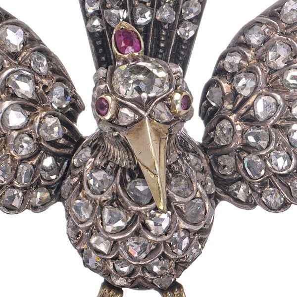 Victoria diamond bird brooch in gold and silver.