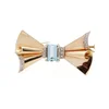 Vintage aquamarine and diamond bow brooch in gold and platinum.