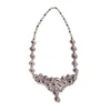 Diamond and ruby necklace in white gold.