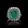 Antique emerald and diamond ring in gold.