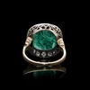 Antique emerald and diamond ring in gold.