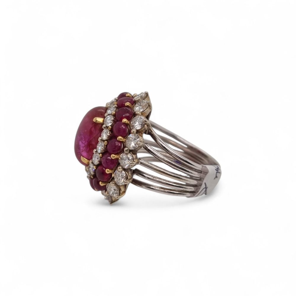 Cabochon ruby and diamond cluster cocktail ring with triple halo in 18ct white gold