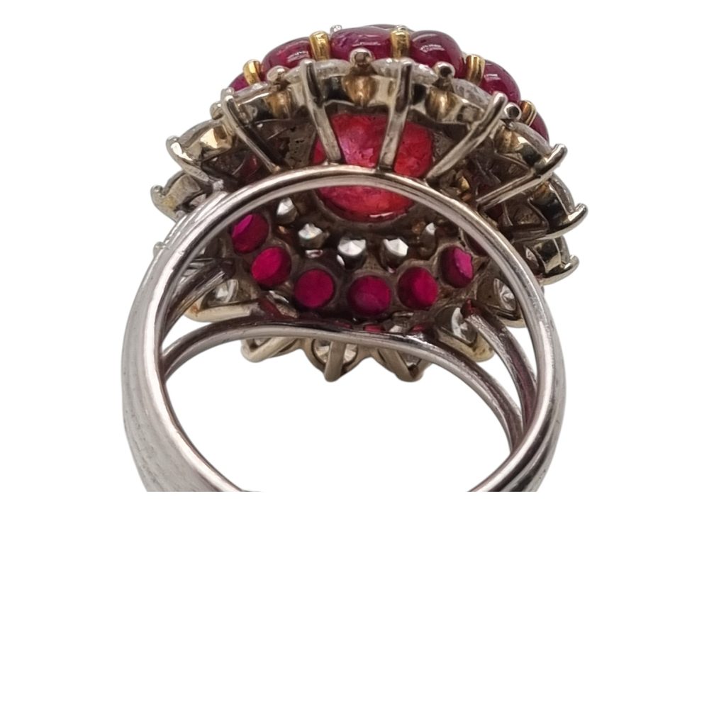 Cabochon ruby and diamond cluster cocktail ring with triple halo in 18ct white gold