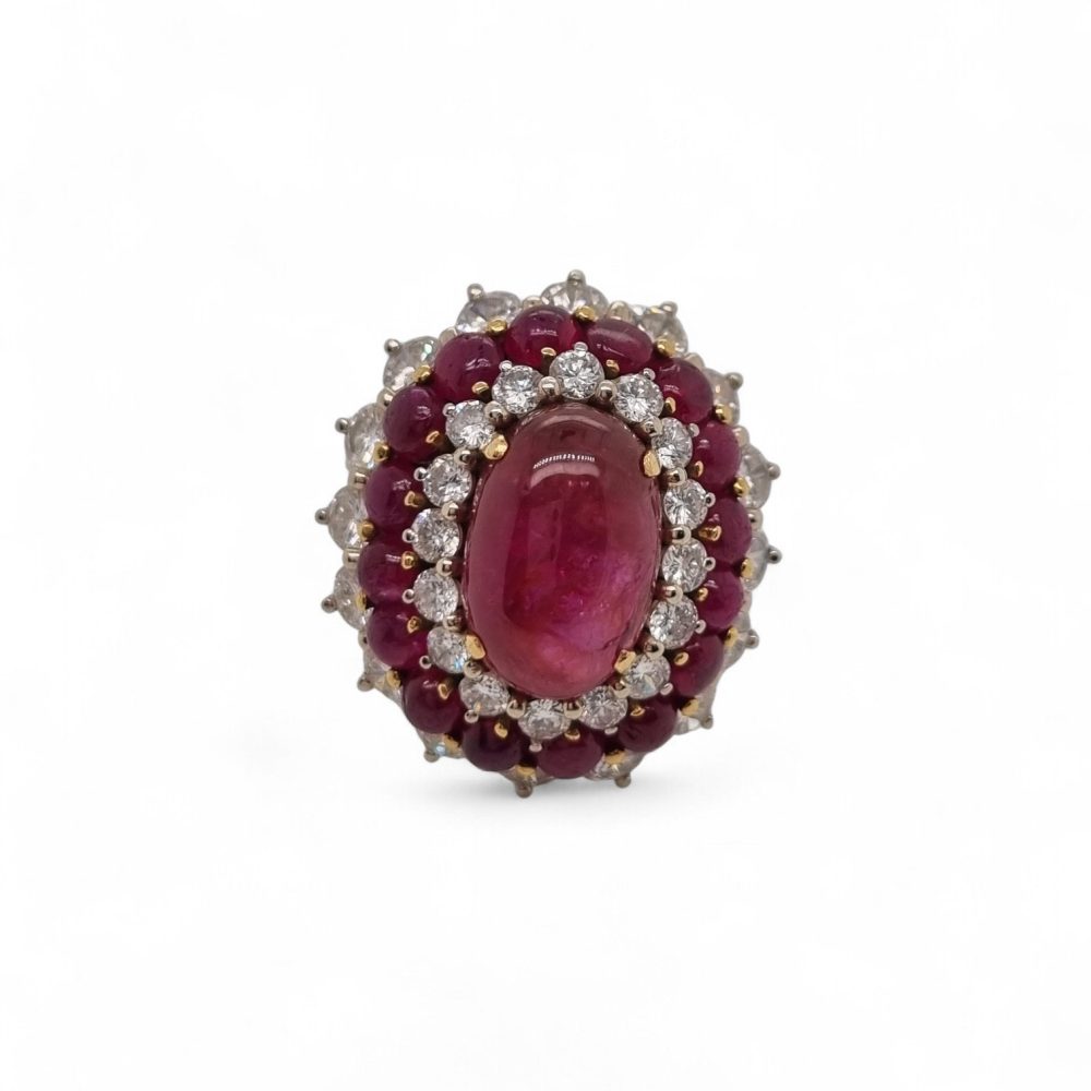 Cabochon ruby and diamond cluster cocktail ring with triple halo in 18ct white gold