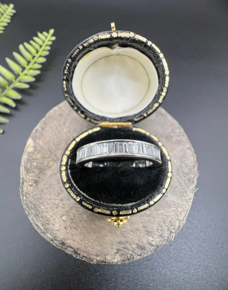 Diamond eternity ring in white gold.