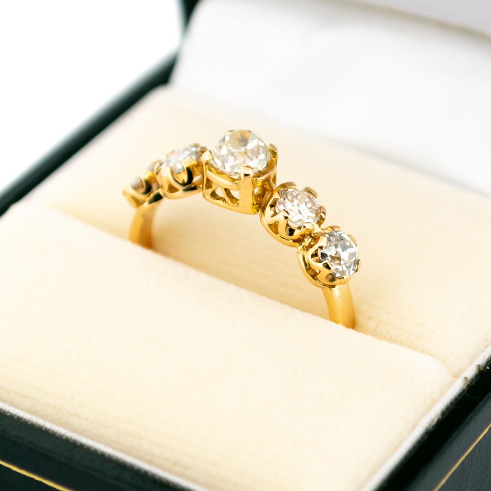 Vintage five stone diamond ring in gold.
